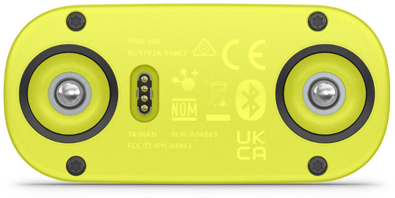 Żółte urządzenie z czarnymi akcentami i srebrnymi detalami. Ma dwa okrągłe elementy i kilka oznaczeń.