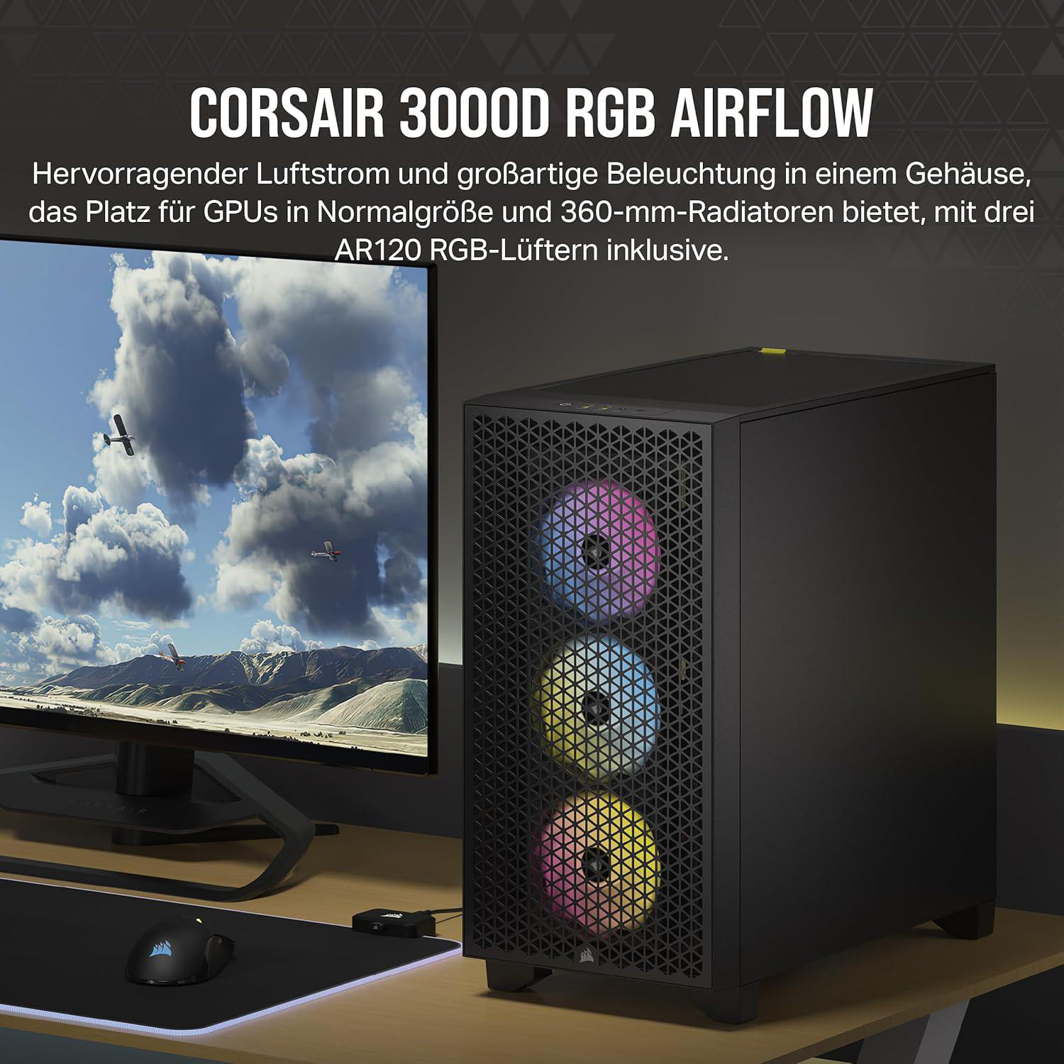Ein schwarzes Computergehäuse mit drei RGB-Lüftern steht auf einem Schreibtisch. Ein Monitor zeigt einen bewölkten Himmel mit Flugzeugen.