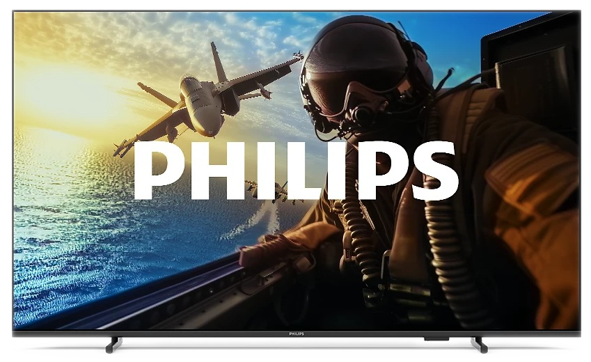 Telewizor Philips wyświetla myśliwiec odrzutowy i pilota w kokpicie. Słowo PHILIPS jest białe na ekranie.