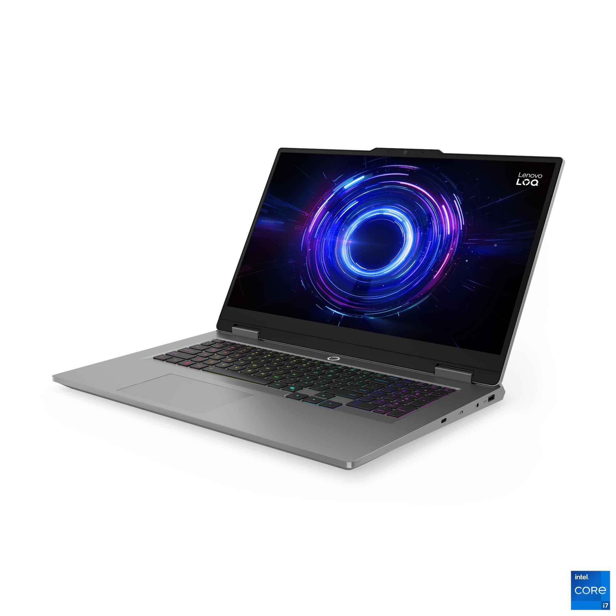 Ein silberner Laptop ist geöffnet. Der Bildschirm zeigt ein blaues und lila kreisförmiges Design. Die Tastatur ist mehrfarbig beleuchtet.