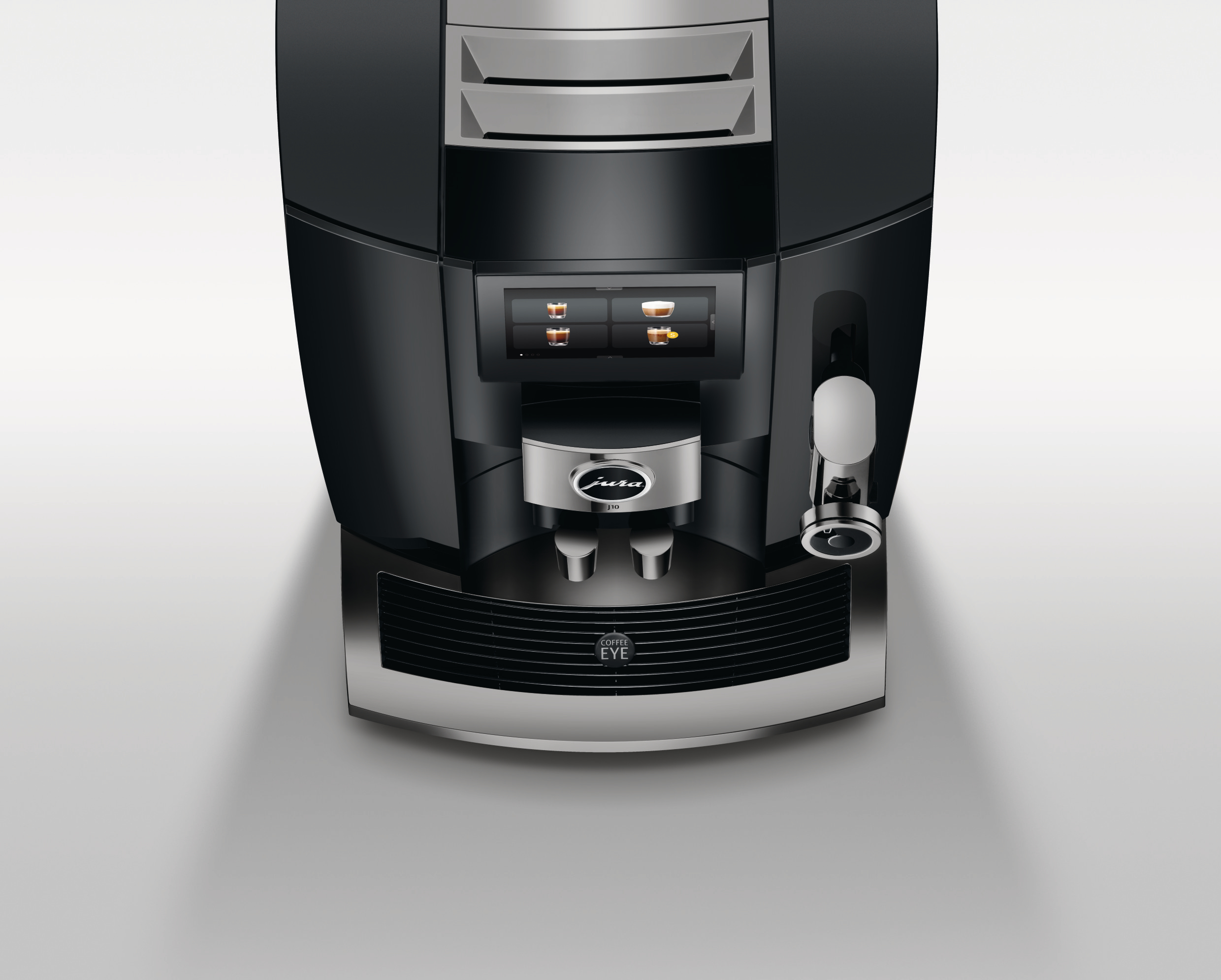 Draufsicht auf eine schwarze und silberne Jura-Kaffeemaschine. Mit Display, Auslauf und zwei Kaffeeausläufen. Weißer Hintergrund.