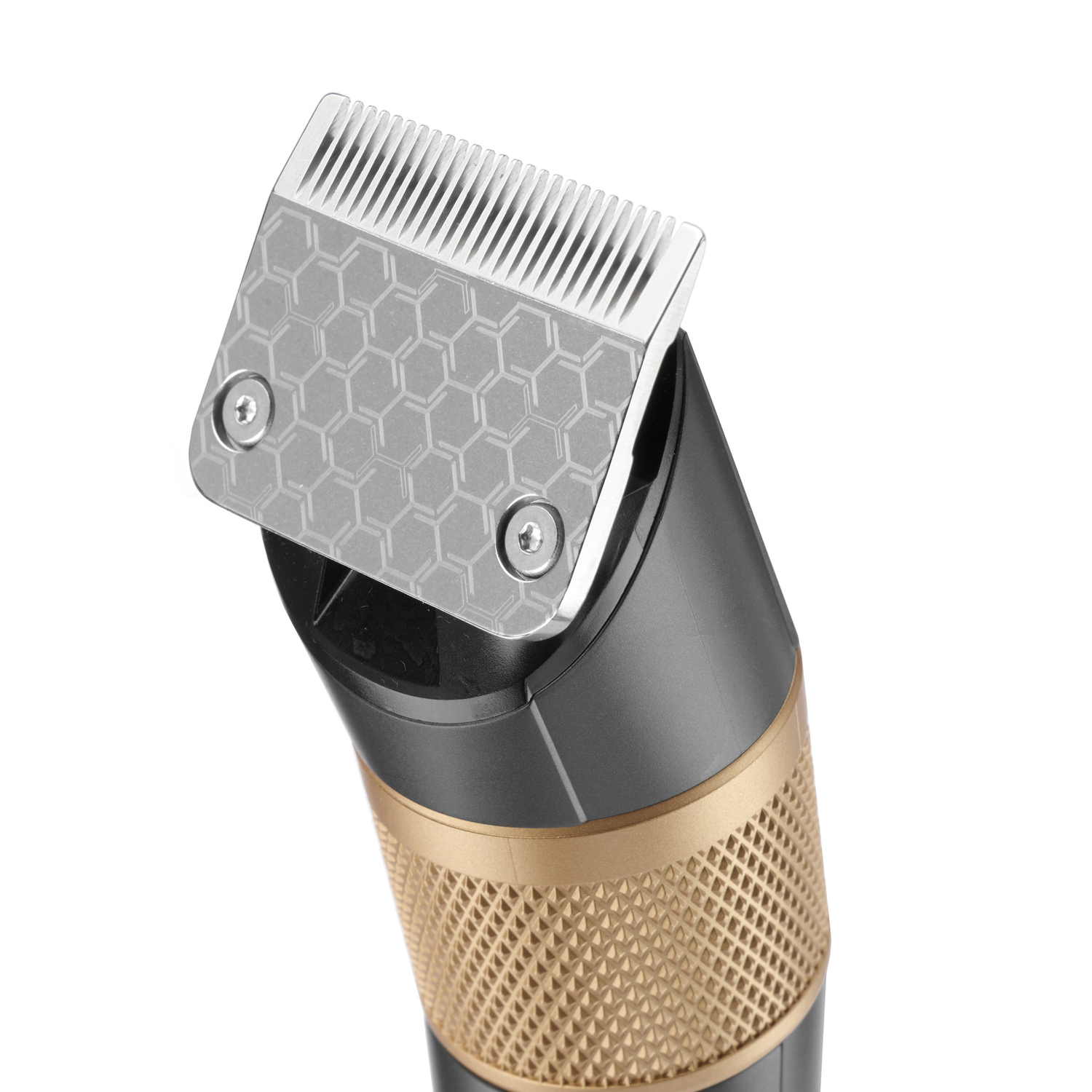 Close-up of a hair clipper. It has a silver blade with a honeycomb pattern. The handle is black and gold.