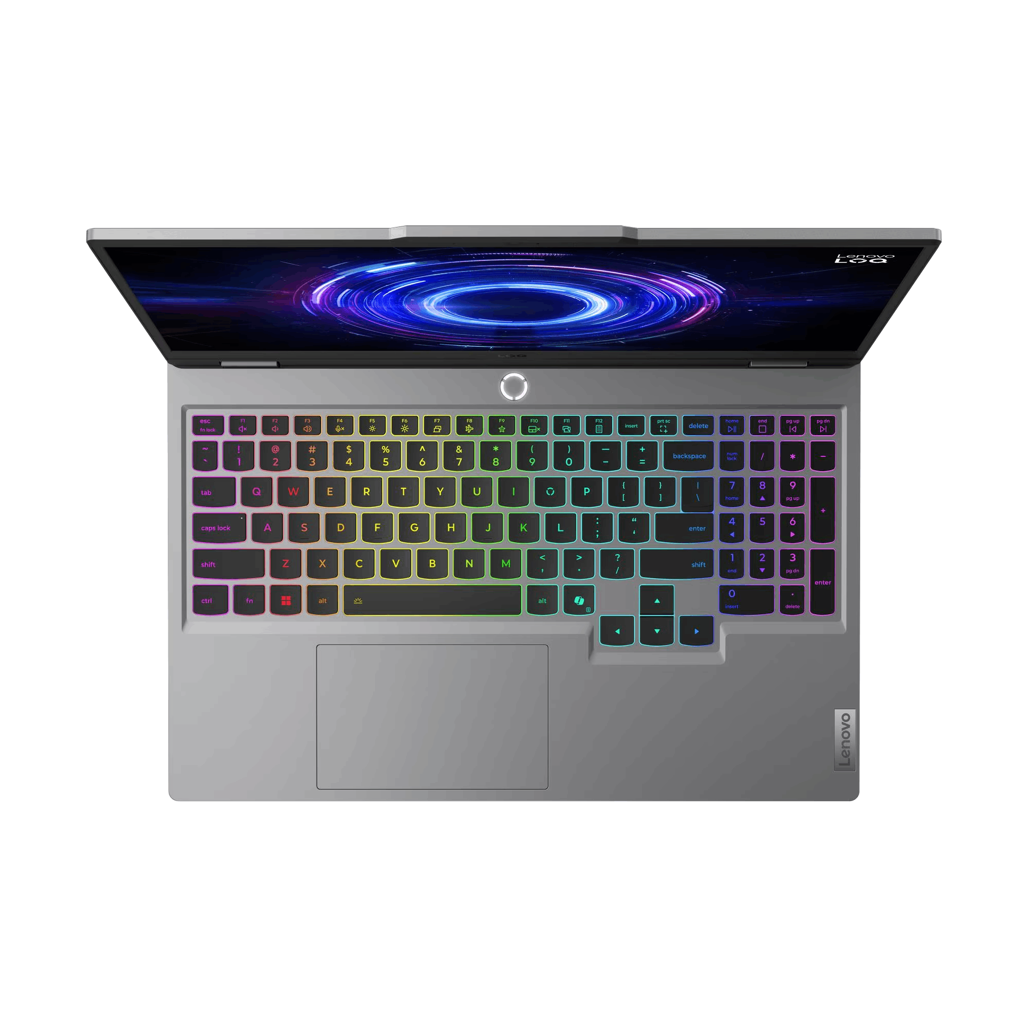 Un portátil Lenovo plateado está abierto, mostrando un teclado colorido y una pantalla brillante con diseño.