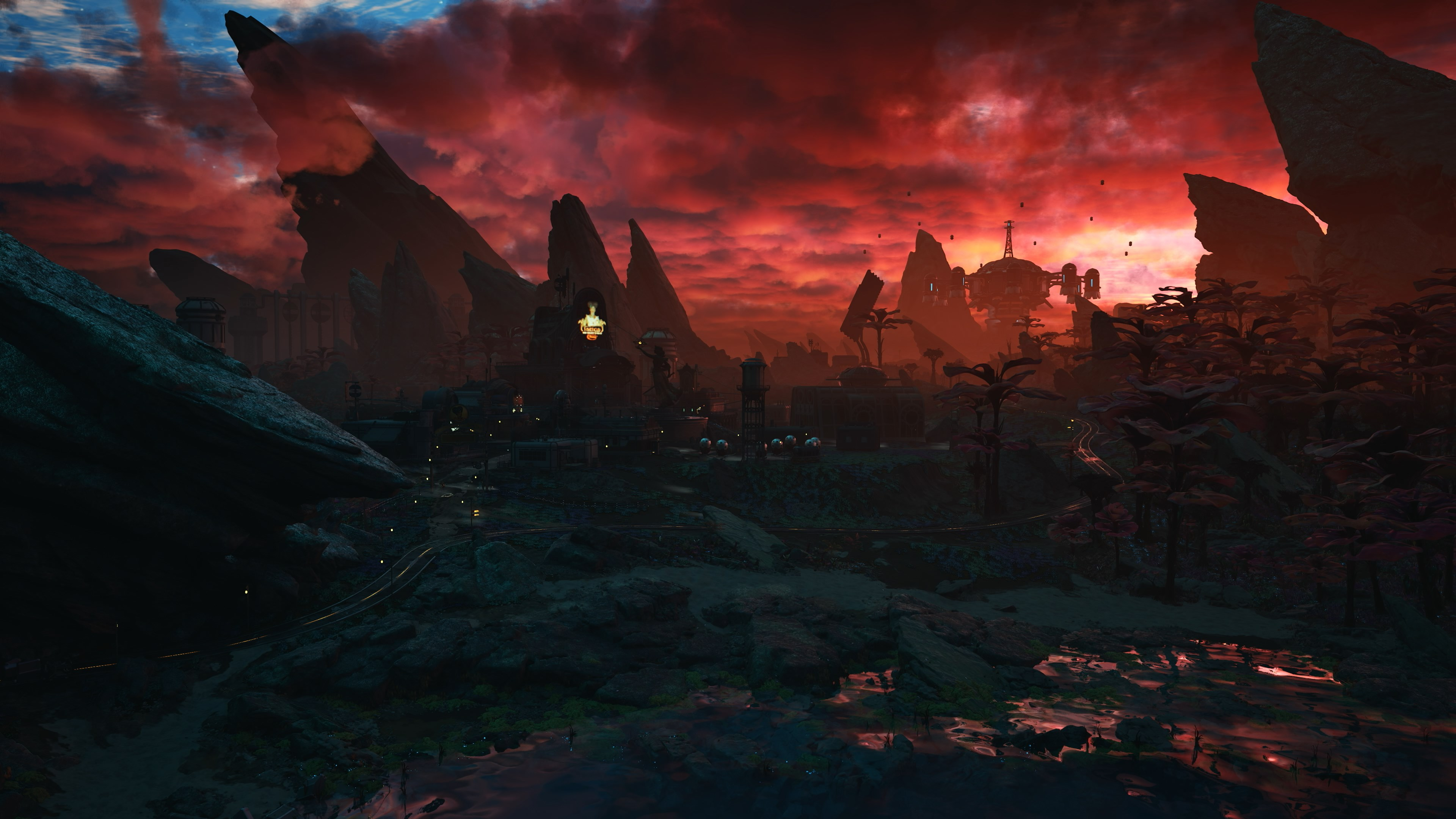 Un paysage de science-fiction avec un ciel rouge. Montagnes, une ville et des plantes extraterrestres sont dans la scène. Le premier plan montre de l'eau et des rochers.