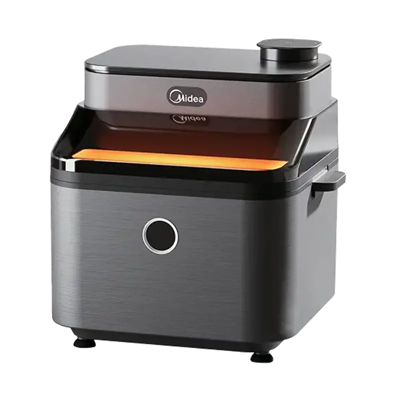 Wytwornica lodu Midea, szara z czarnym blatem i okrągłym przyciskiem. Ma przezroczysty odcinek z pomarańczową poświatą.