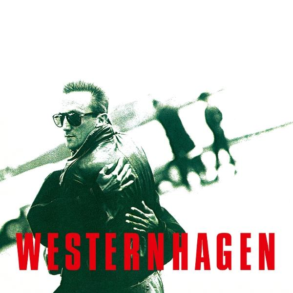 Mann mit Sonnenbrille umarmt eine andere Person. Das Wort 'WESTERNHAGEN' steht rot am unteren Bildrand.