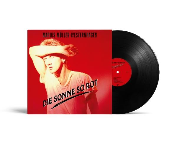 Albumcover mit rotem Hintergrund. Ein Mann mit dem Arm über den Augen ist auf dem Cover. Eine Schallplatte liegt daneben.