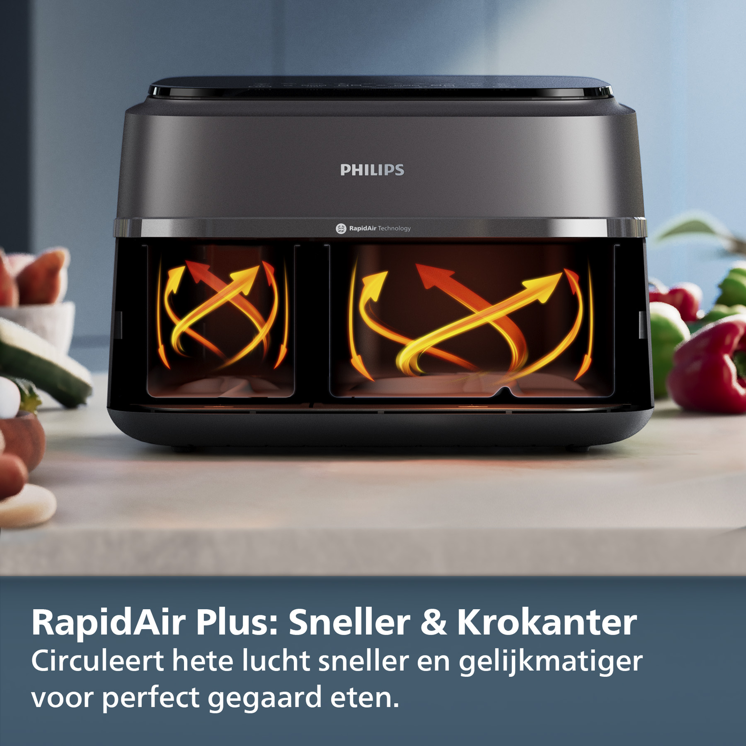 A Philips RapidAir air fryer showing hot air circulation. The device is black, with orange arrows indicating the air flow. Vegetables are in the background.