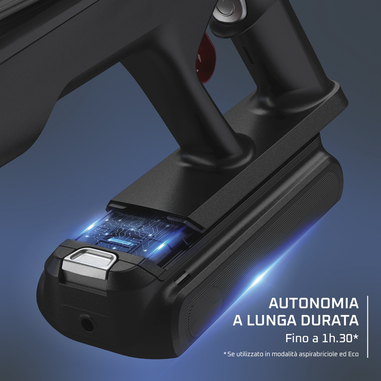 Primo piano di un aspirapolvere nero con un circuito stampato. Testo: BATTERIA A LUNGA DURATA, fino a 1h.30*