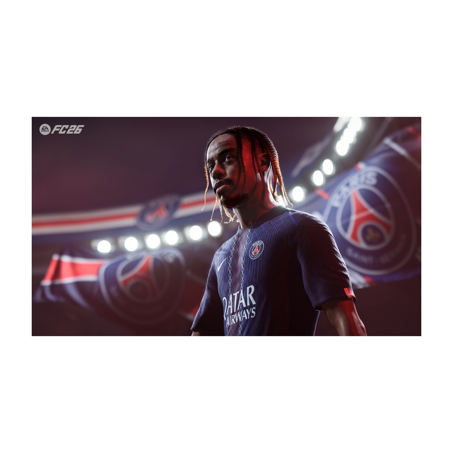 Un calciatore in maglia blu guarda in su, con luci dello stadio e logo sullo sfondo.