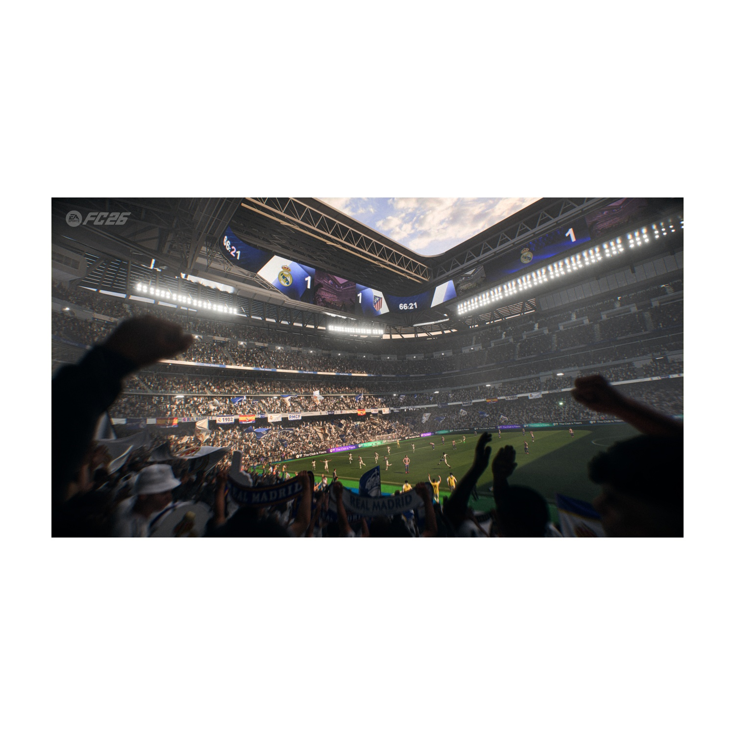Uno stadio di calcio pieno di tifosi, un tabellone mostra 1-1. I giocatori sono sul campo. I tifosi tifano con bandiere e braccia alzate.