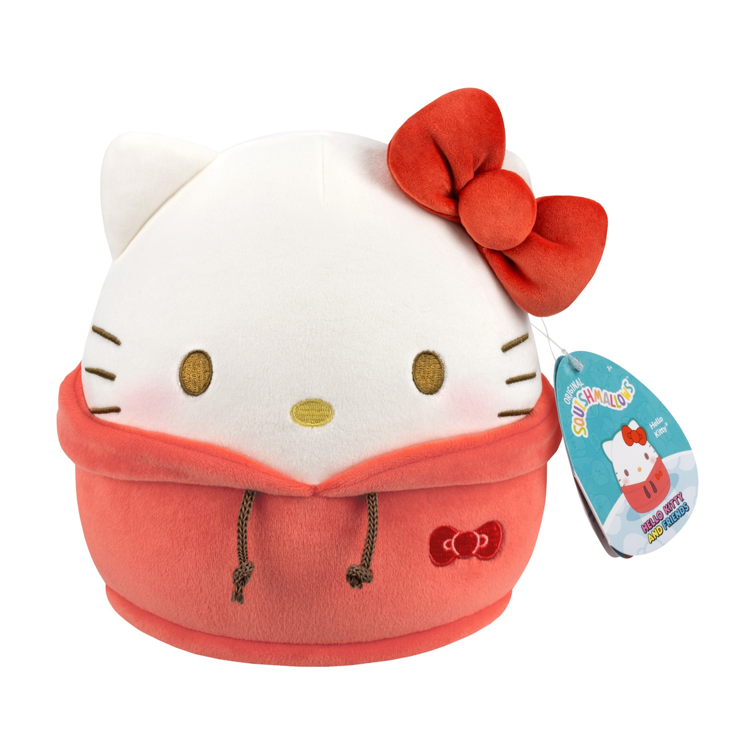 Un peluche di Hello Kitty con cappuccio e fiocco rossi. Ha gli occhi marroni e un'etichetta con scritto "Hello Kitty and Friends".