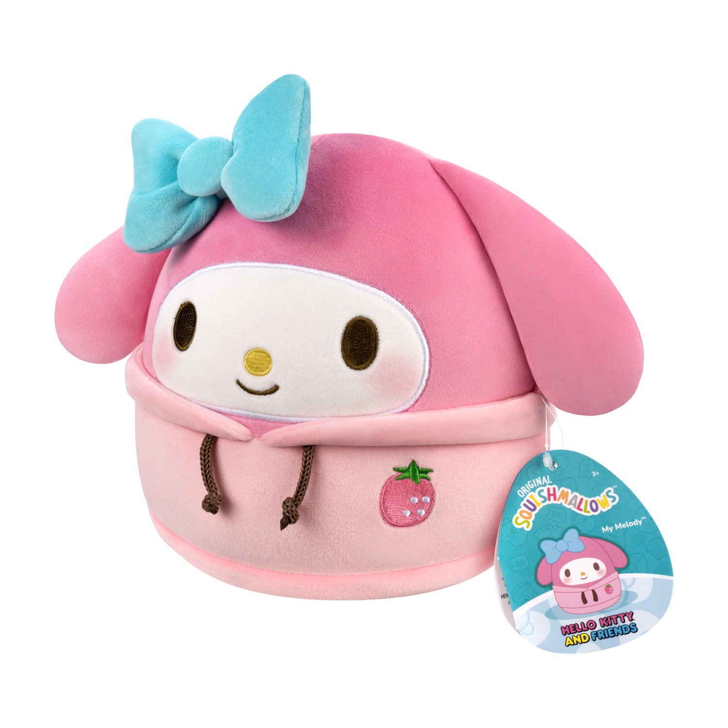 Un peluche rosa di My Melody con un fiocco blu, occhi marroni e una fragola sul petto. Ha un'etichetta con scritto 'Hello Kitty and Friends'.