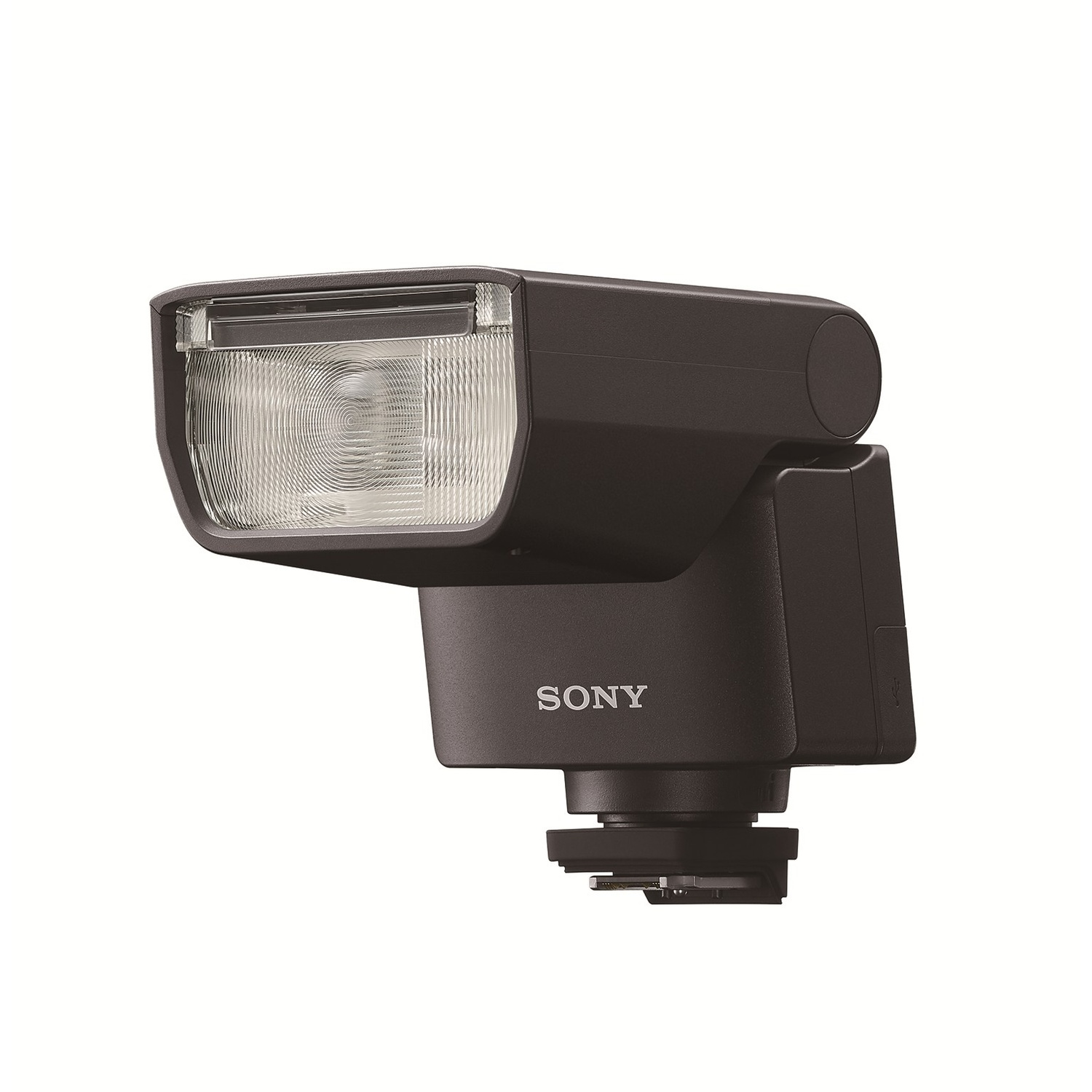 Un flash per fotocamera Sony grigio scuro su sfondo bianco. Il flash ha una testa arrotondata e il marchio 'SONY' è visibile.