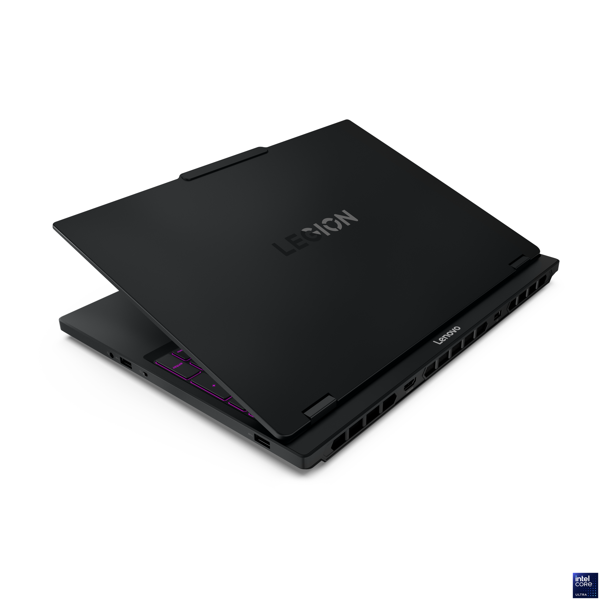 Siyah bir Lenovo Legion dizüstü bilgisayar açık, pembe arka aydınlatmalı bir klavye ortaya çıkıyor. Lenovo ve Legion logoları görünür.