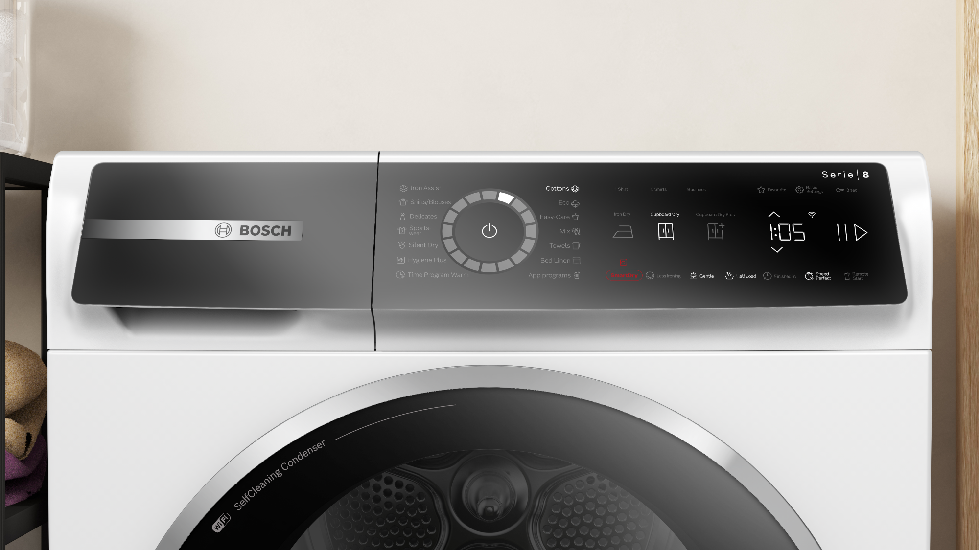 Bosch Serie 8 mosógép vezérlőpanelje. Különböző mosási beállításokat, időzítőt és programválasztási lehetőségeket mutat.