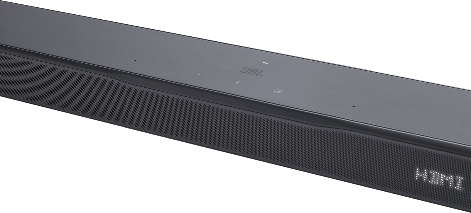 Egy sötétszürke JBL soundbar közelképe. Van rajta JBL logó, gombok és egy perforált hangszóró rács. HDMI látható.