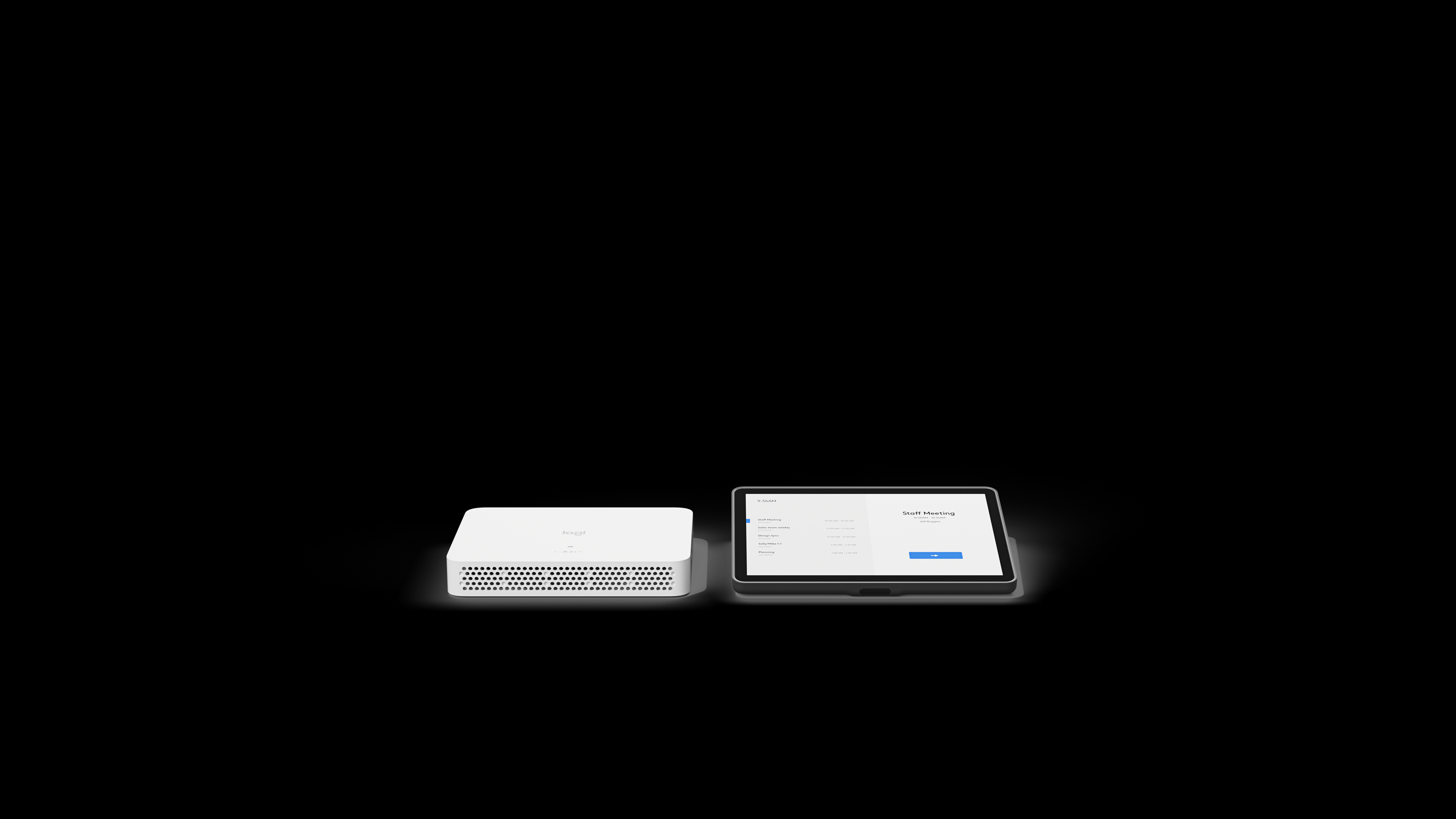 Ein weißes Gerät und ein Tablet liegen auf einer schwarzen Oberfläche. Das Tablet zeigt einen Zeitplan für das Mitarbeitertreffen.