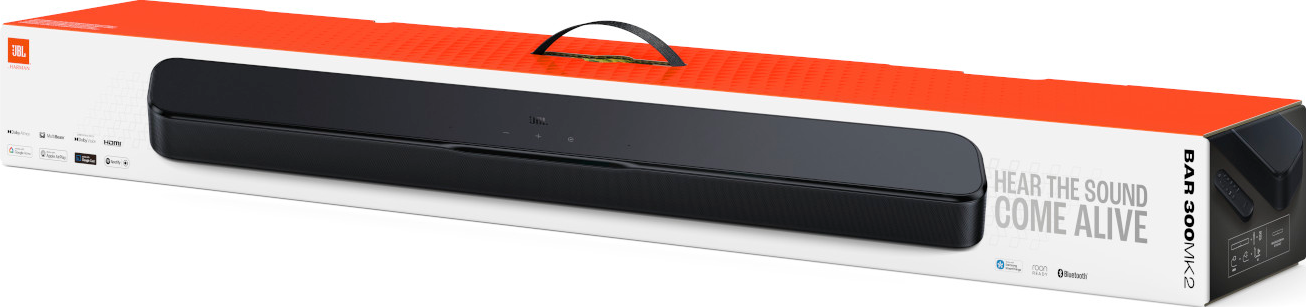 Eine JBL Bar 300 MK2 Soundbar in ihrer Verpackung. Die Box ist weiß und orange. Die Soundbar ist schwarz.