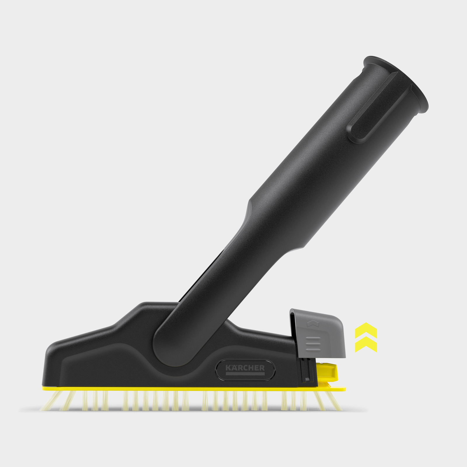 Egy fekete-sárga Karcher tisztítóeszköz. Kefefejjel, fogantyúval és reteszelő mechanizmussal rendelkezik. A háttér fehér.