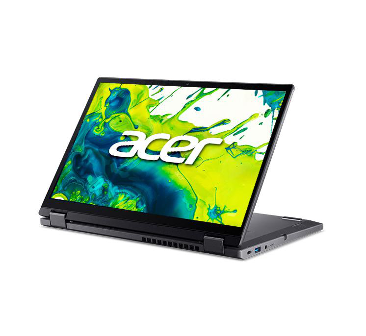 Ein Acer-Laptop ist geöffnet und zeigt ein grünes und gelbes abstraktes Bild. Der Laptop ist schwarz, das Acer-Logo ist sichtbar.