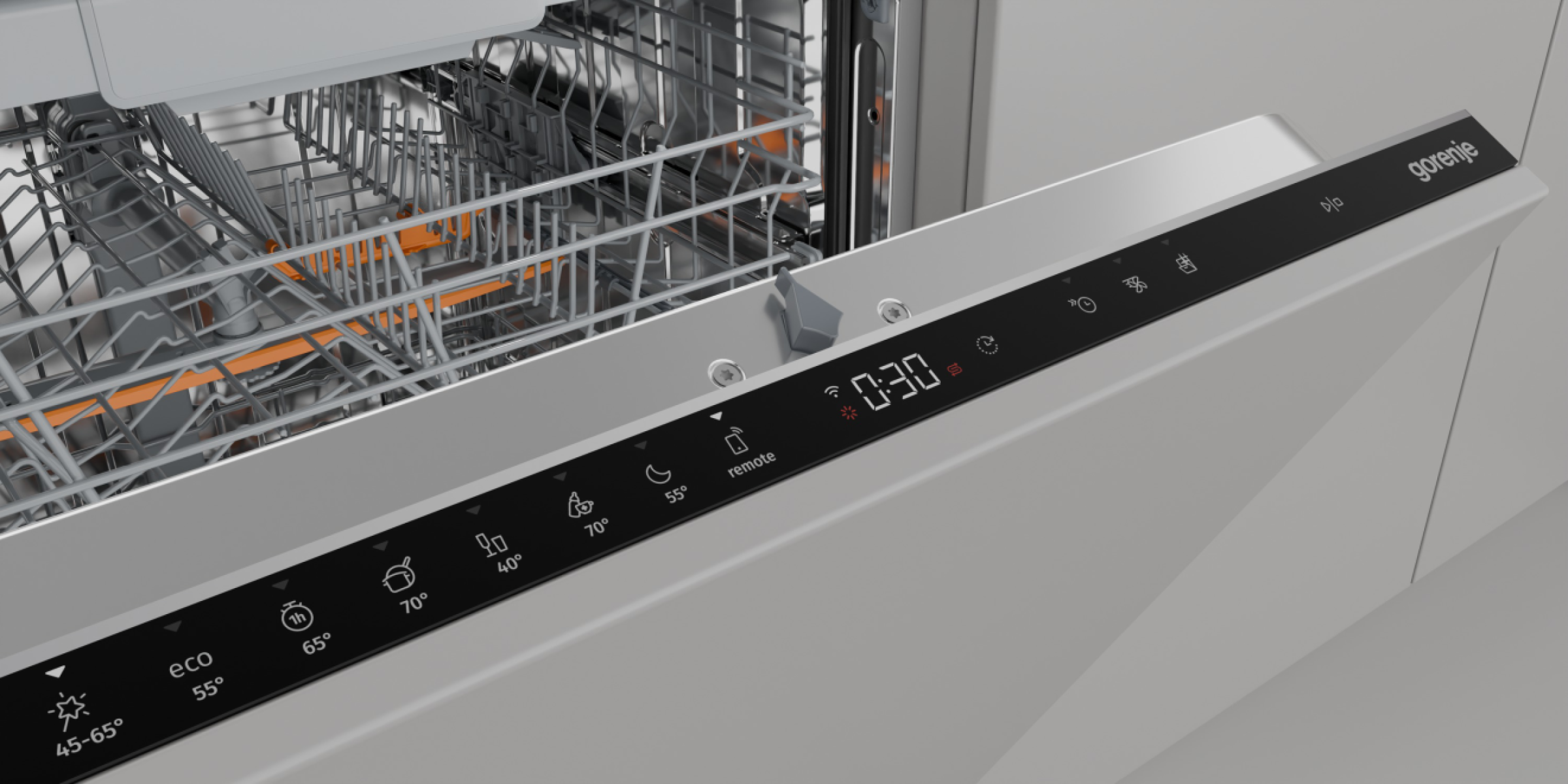 Wnętrze zmywarki. Panel sterowania wyświetla czas i ustawienia. Srebrny i czarny design. Widoczne logo Gorenje.