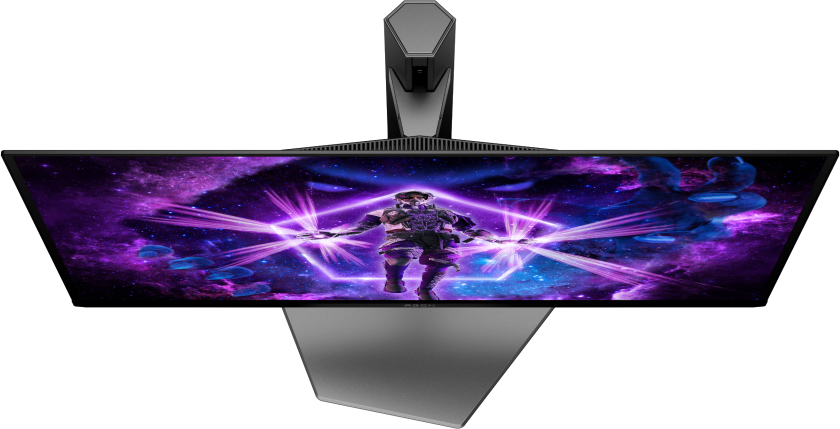 Moniteur avec une scène spatiale. Une figure tient des faisceaux de lumière. Le support est gris.