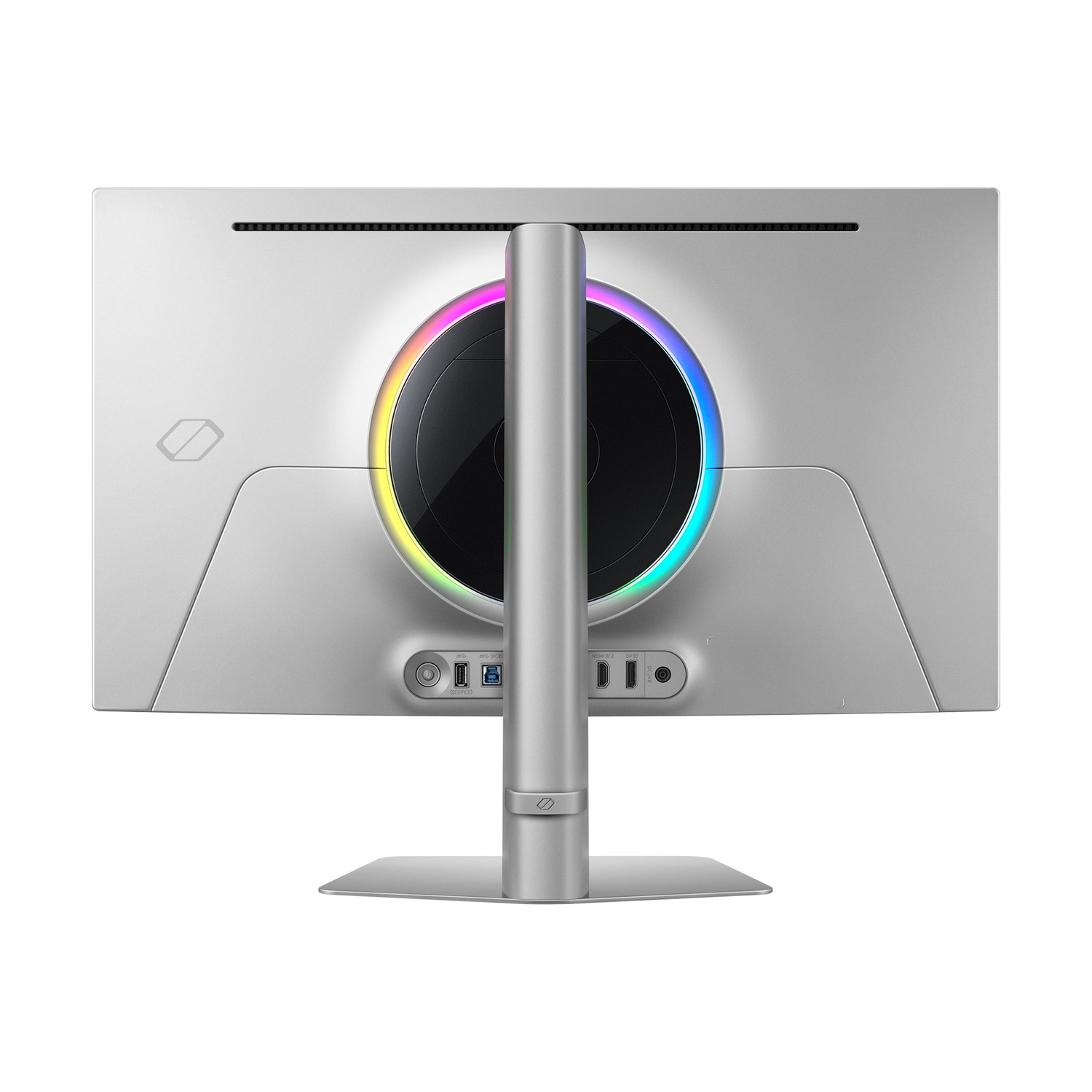 Retro di un monitor per computer argentato. Presenta un design circolare centrale con un anello luminoso colorato e varie porte in basso.