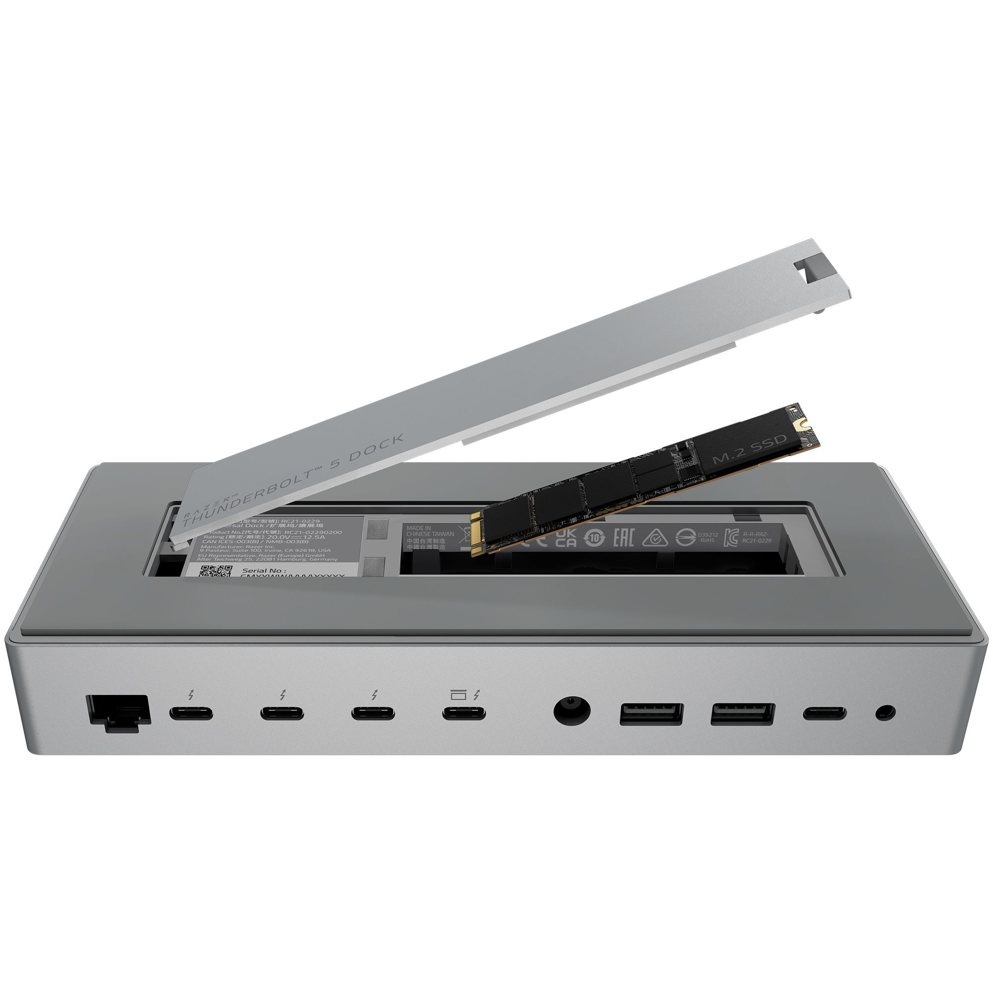 Silberne Thunderbolt 5 Dock mit installierter M.2 SSD. Anschlüsse sind auf der Vorderseite sichtbar. Die obere Abdeckung ist offen.