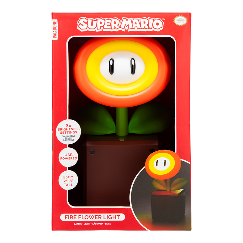 Ein Super Mario Feuerblumenlicht in einer roten Schachtel. Es hat eine gelbe und orangefarbene Blume mit grünen Blättern. Die Schachtel ist rot.