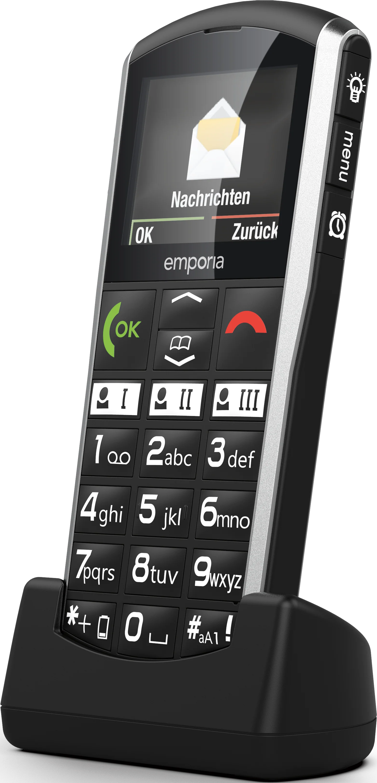 Un téléphone mobile Emporia noir et argent avec de gros boutons, un écran affichant une icône de message et un socle de chargement.