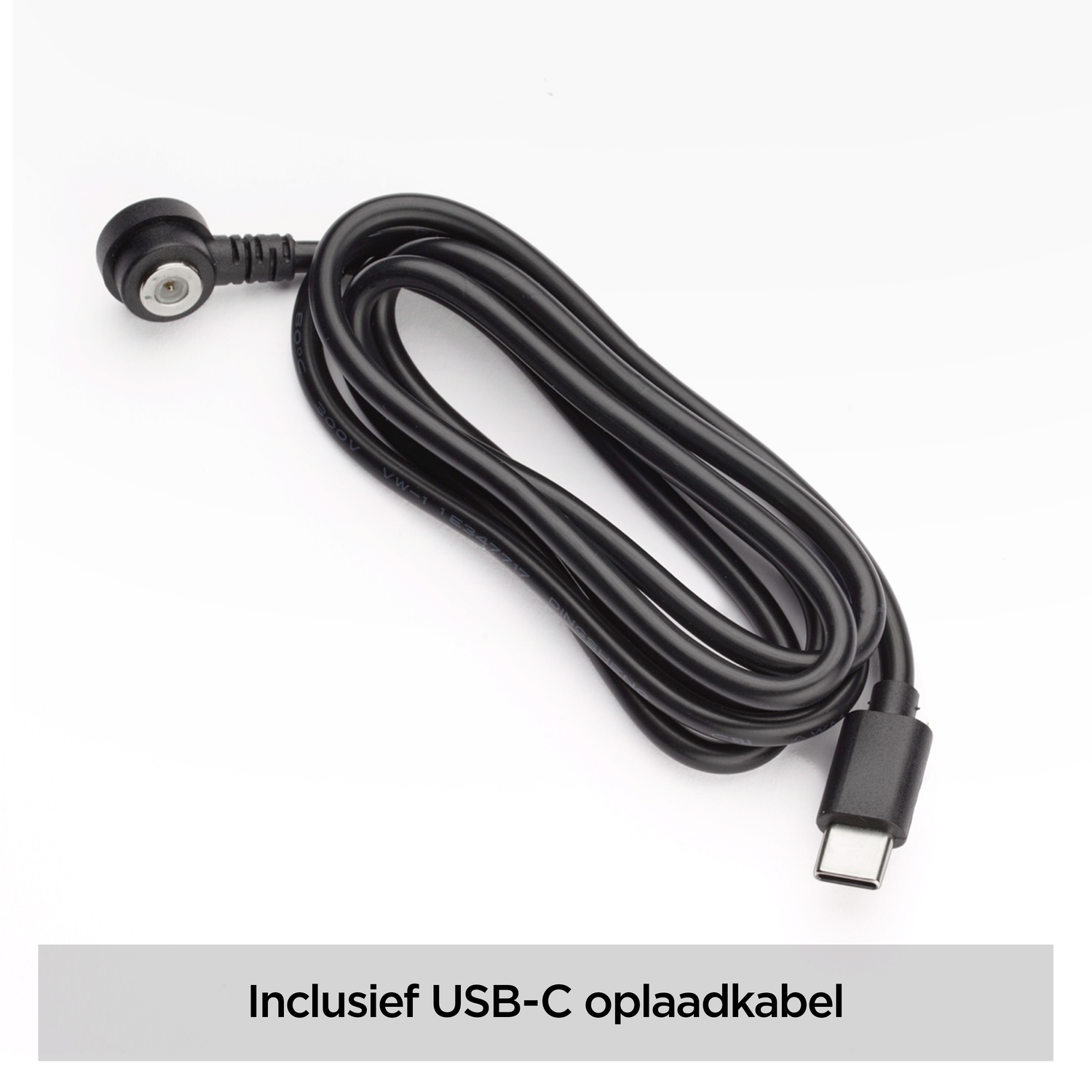 A black USB-C charging cable with a rounded connector and a USB-C connector lies on a white surface.