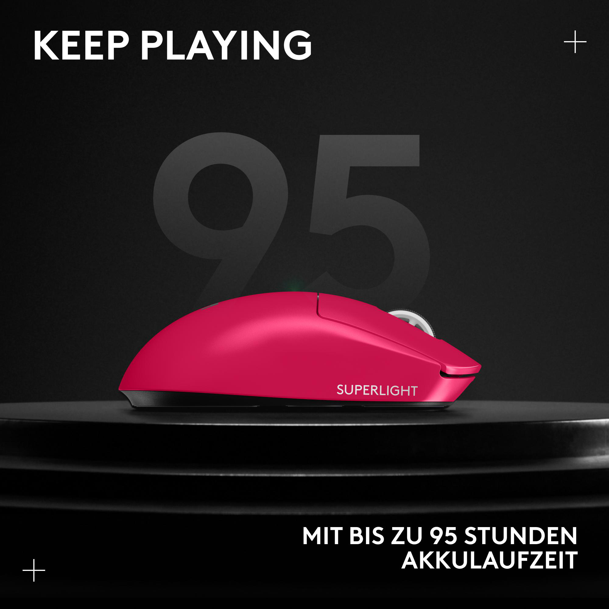 Eine pinkfarbene kabellose Maus liegt auf einer schwarzen Oberfläche. Die Zahl 95 ist hinter der Maus.