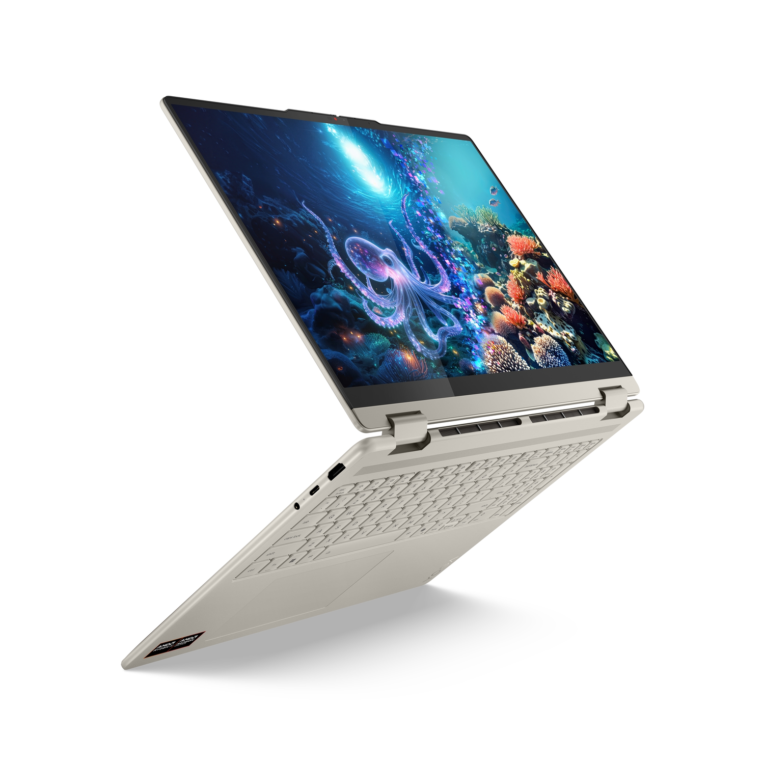 A beige laptop is slightly open, displaying an underwater scene with an octopus. The background is white.