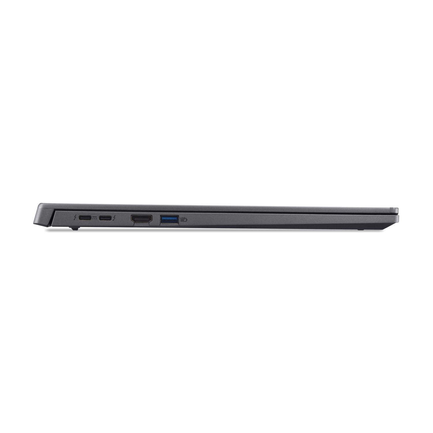 Un ordinateur portable fermé, gris foncé, vu de côté, montrant des ports comme USB, HDMI et charge, sur fond blanc.
