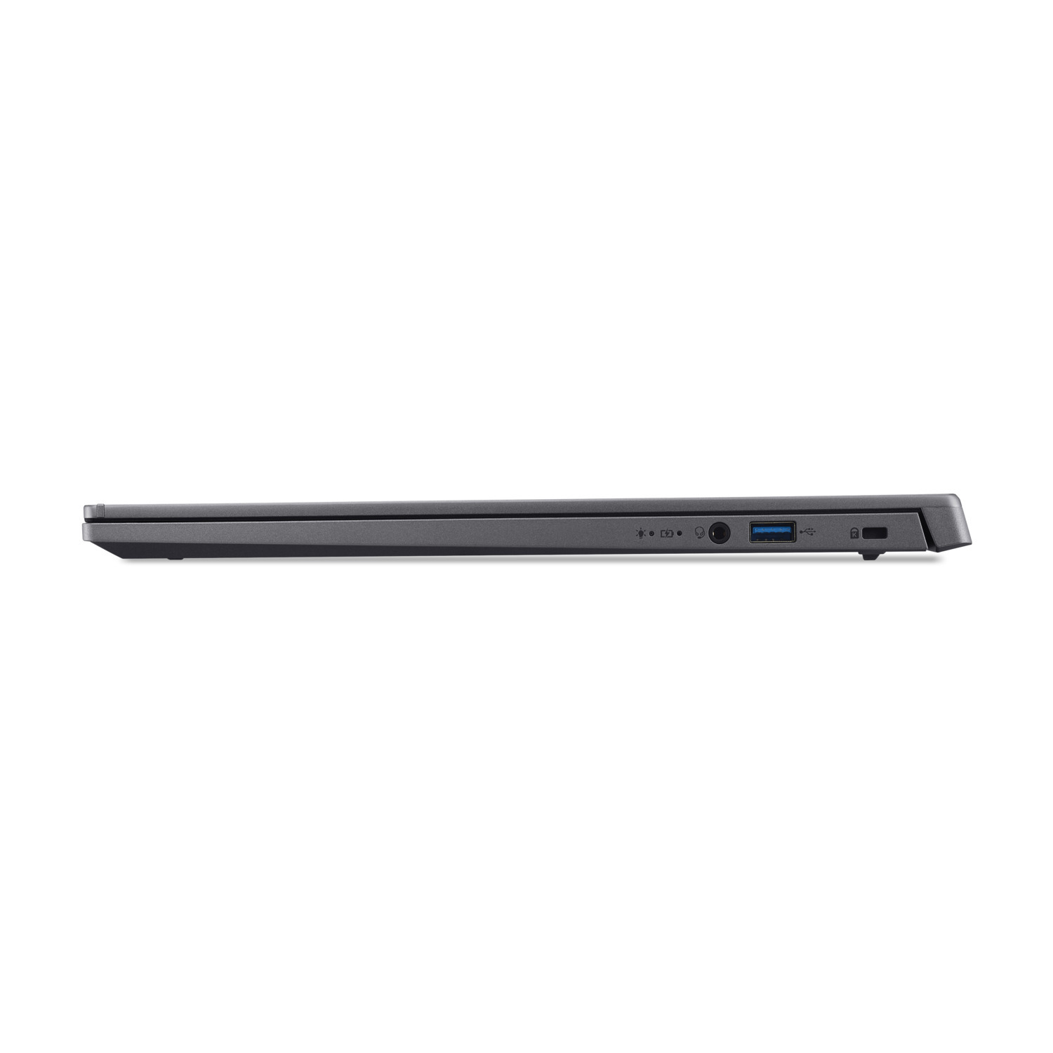 Vue latérale d'un ordinateur portable gris fermé. Les ports visibles incluent USB, alimentation et audio. Le fond est blanc.