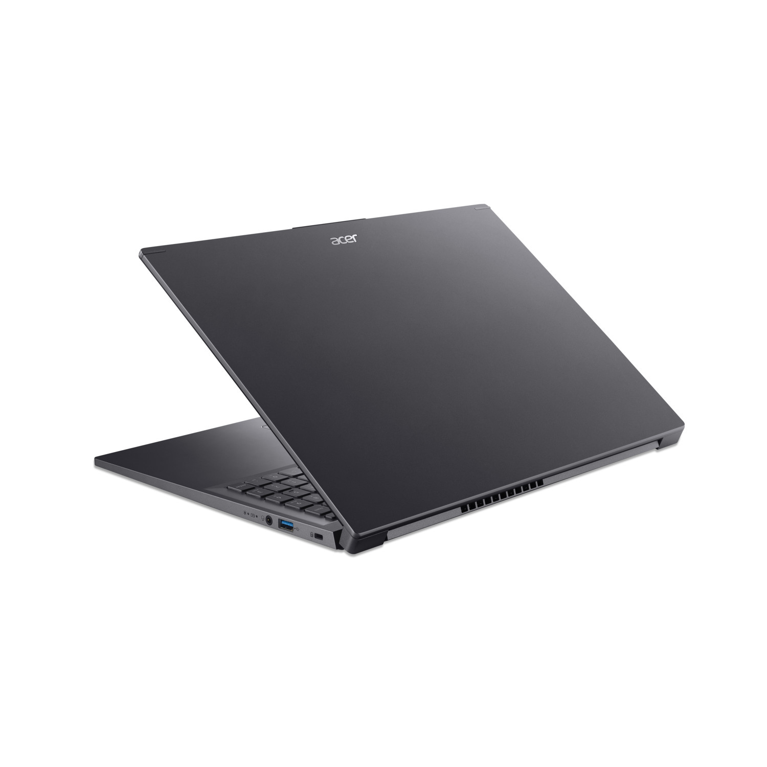 Un ordinateur portable Acer gris foncé est ouvert sur fond blanc. L'écran est incliné, affichant le clavier et le pavé tactile.
