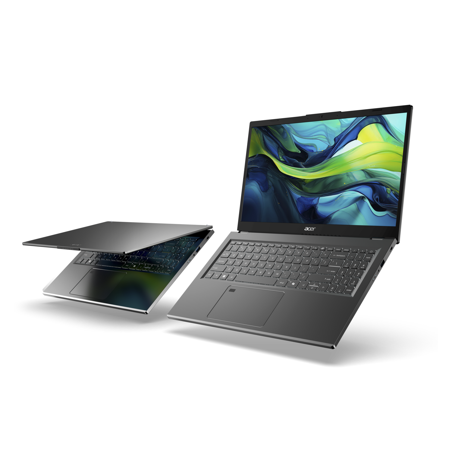 Two Acer laptops. One open, the other partially open, displaying colorful abstract wallpaper. Both are gray on a black background.