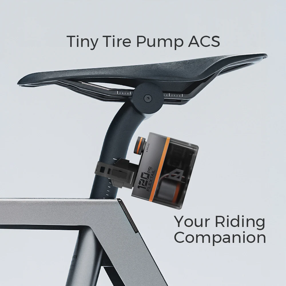 Kerékpár ülése és váza, gumiabroncs-pumpával. Szöveg: Tiny Tire Pump ACS, Your Riding Companion.