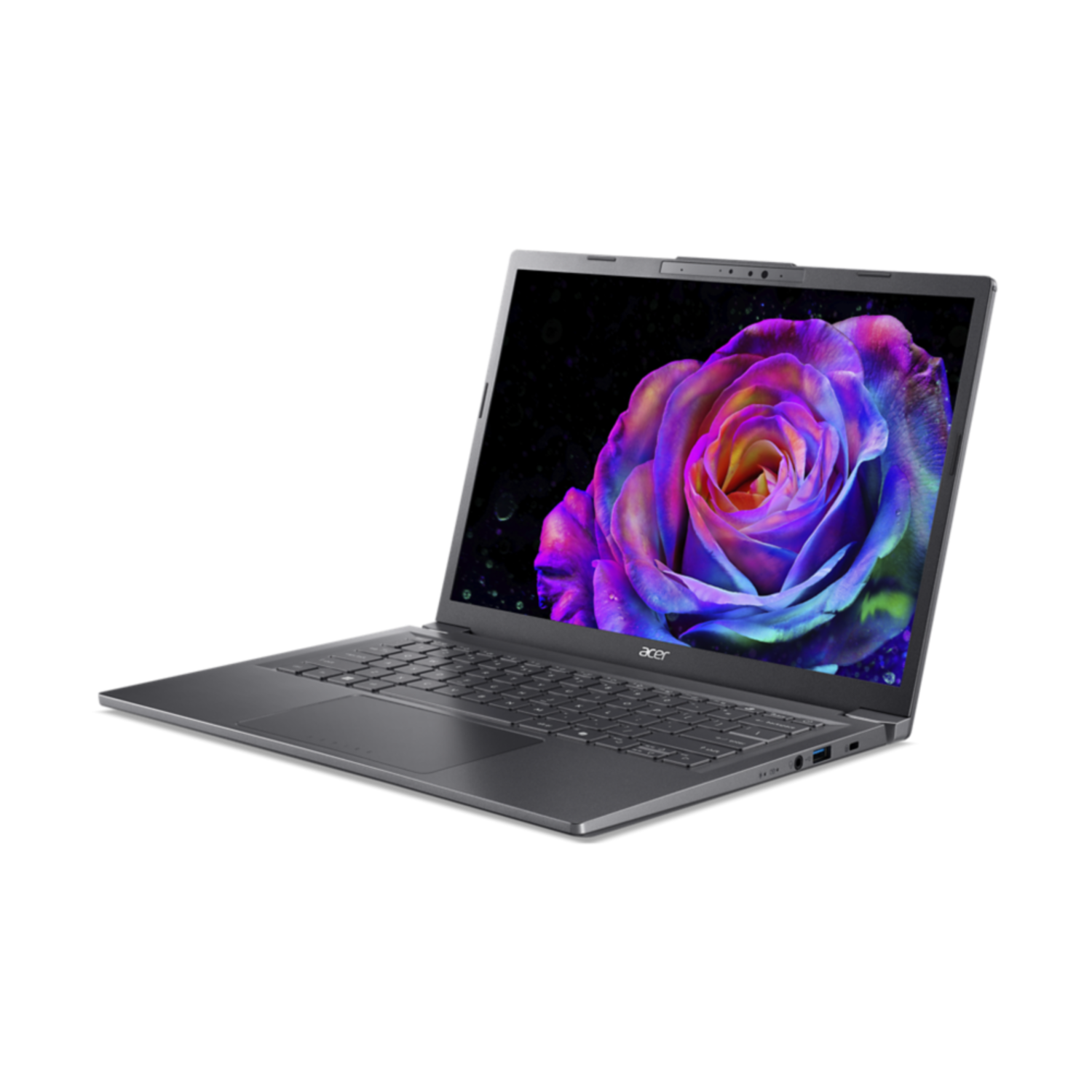 A silver Acer laptop is open. The screen shows a colorful rose against a black background. Black background.