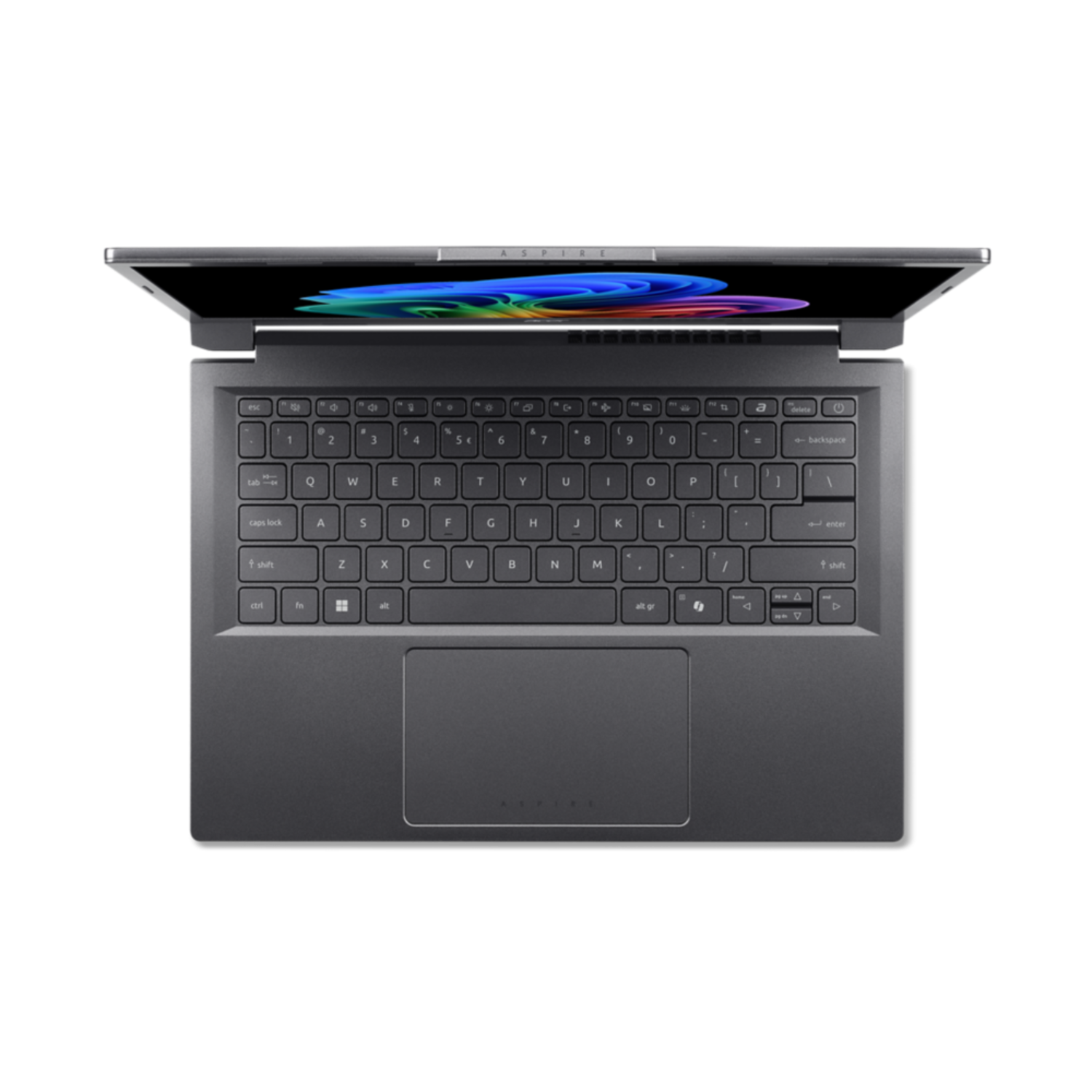 A dark gray laptop is open on a black surface. The keyboard is visible, with a colorful display. "Aspire" is on the screen.
