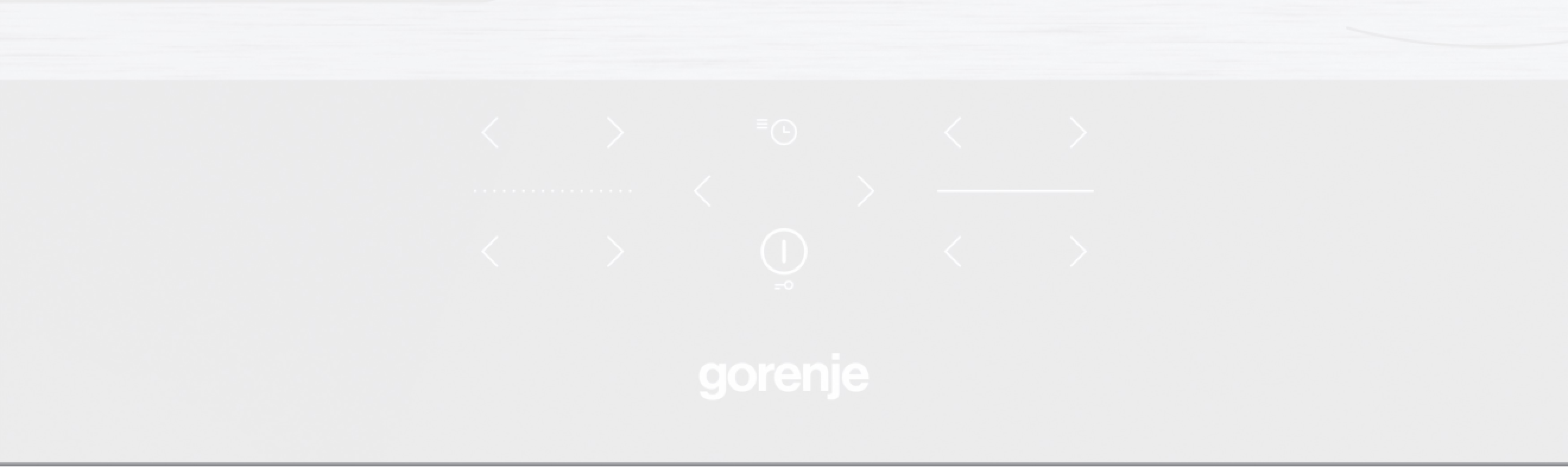 Jasnoszary interfejs z ikonami i strzałkami. Marka "gorenje" na dole.