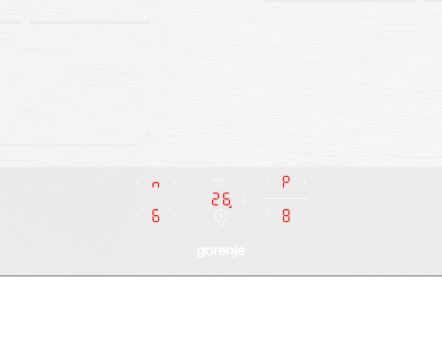 Biały panel sterowania kuchenką z czerwonym wyświetlaczem cyfrowym pokazującym temperaturę i moc. Widoczna nazwa marki Gorenje.