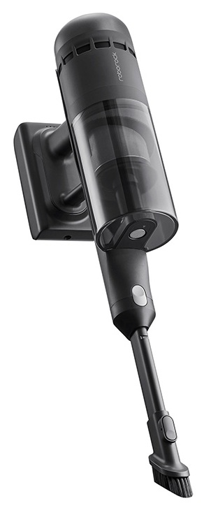 Czarny odkurzacz bezprzewodowy Roborock, zamontowany na ładowarce ściennej. Szczotka jest na dole, z przezroczystym pojemnikiem na kurz.