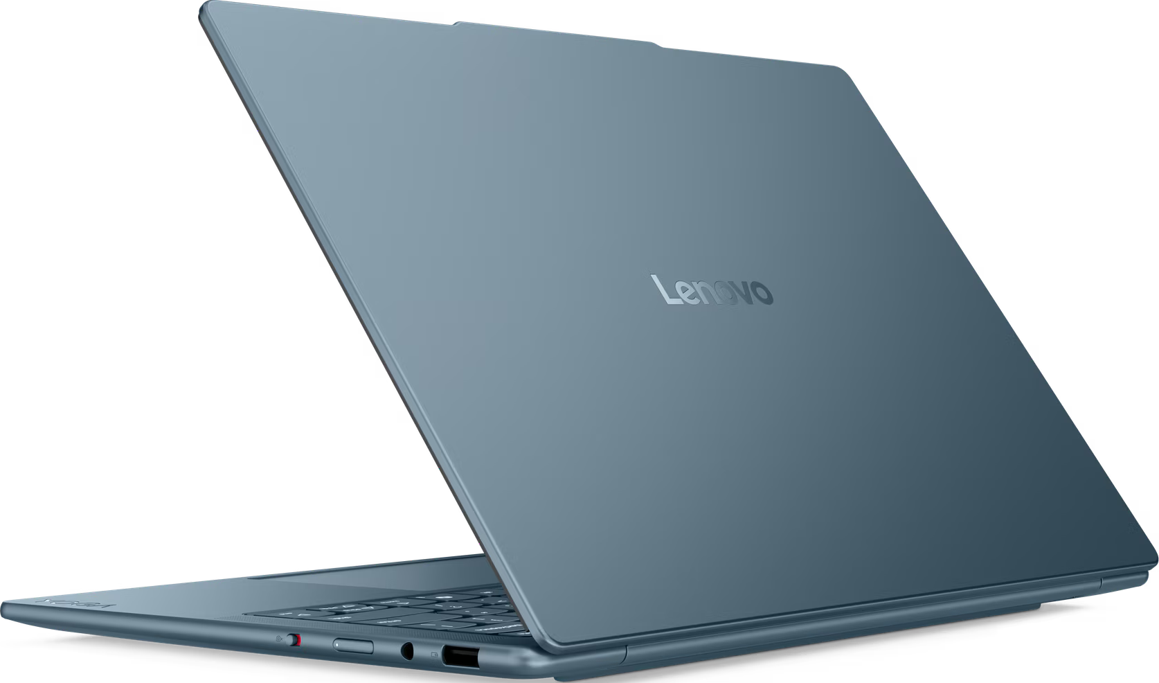 Un ordinateur portable Lenovo bleu est légèrement ouvert, montrant le clavier et le logo Lenovo. Le fond est noir.