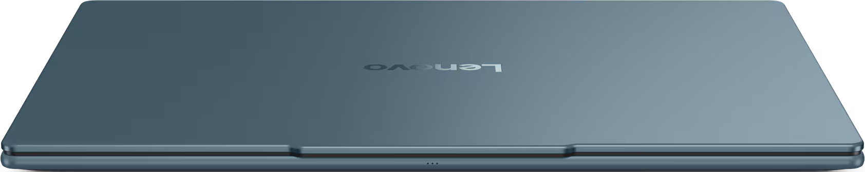 Vue de dessus d'un ordinateur portable Lenovo bleu fermé. Le logo Lenovo est visible. L'ordinateur est sur fond noir.