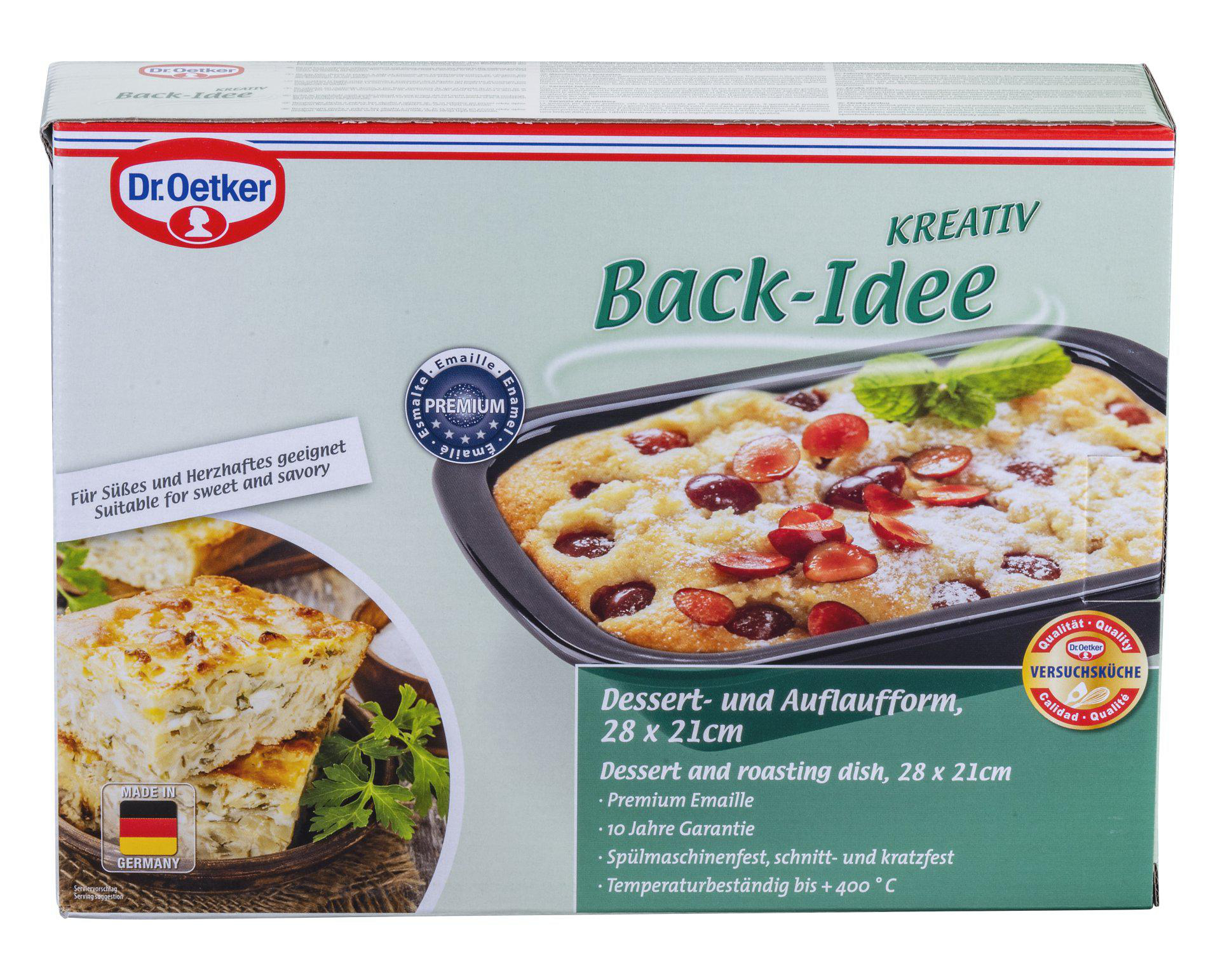 Die Box zeigt ein gebackenes Dessert mit Kirschen. Es ist ein Dr. Oetker Back-Idee Produkt. Text: Dessert- und Auflaufform, 28 x 21cm.