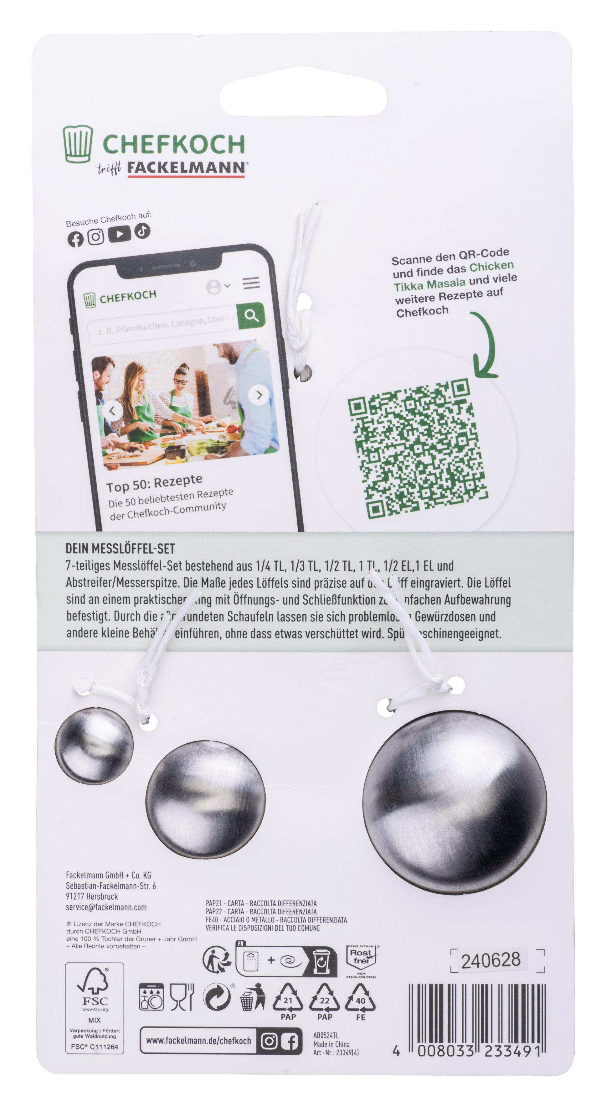 Weiße Karte mit Chefkoch-Logo, QR-Code und Messlöffel-Set. Enthält Produktinformationen und einen Barcode.