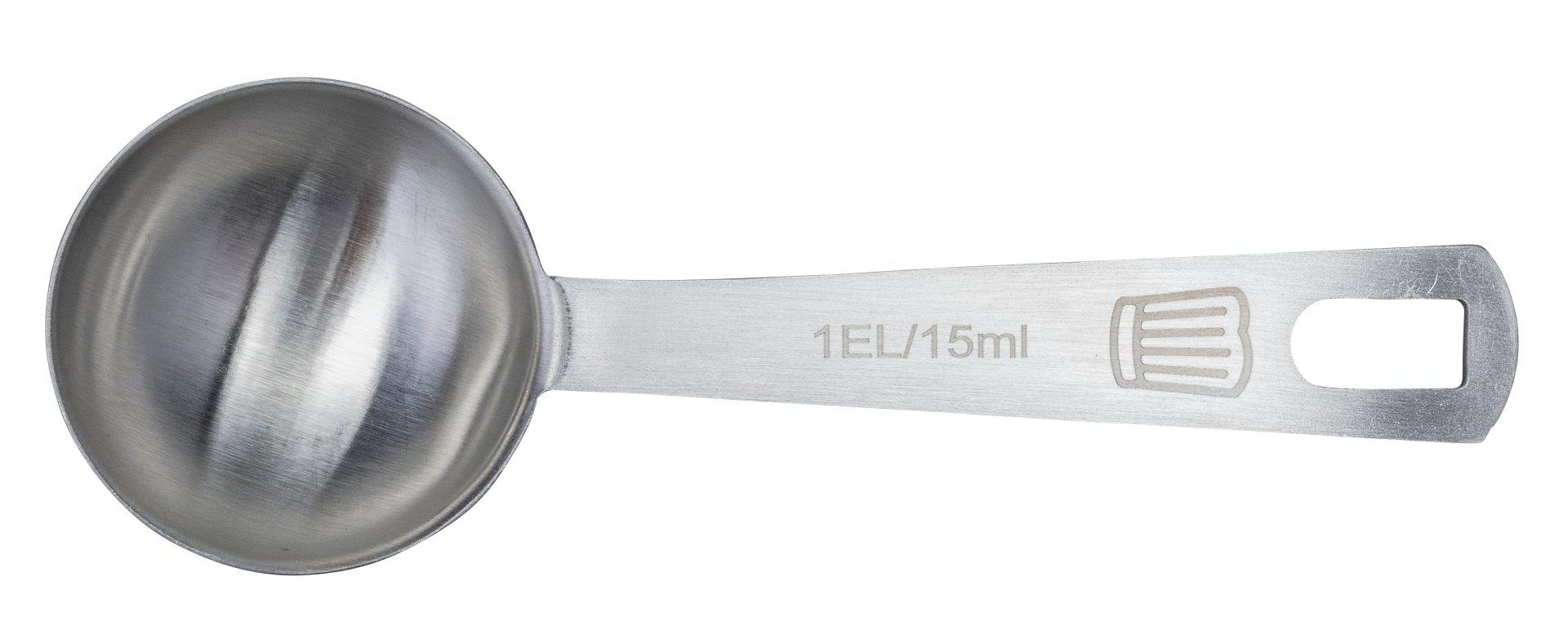 Ein Messlöffel aus Edelstahl. Der Löffel hat eine abgerundete Schüssel und einen flachen Griff mit 1EL/15ml Markierung und einem rechteckigen Loch.