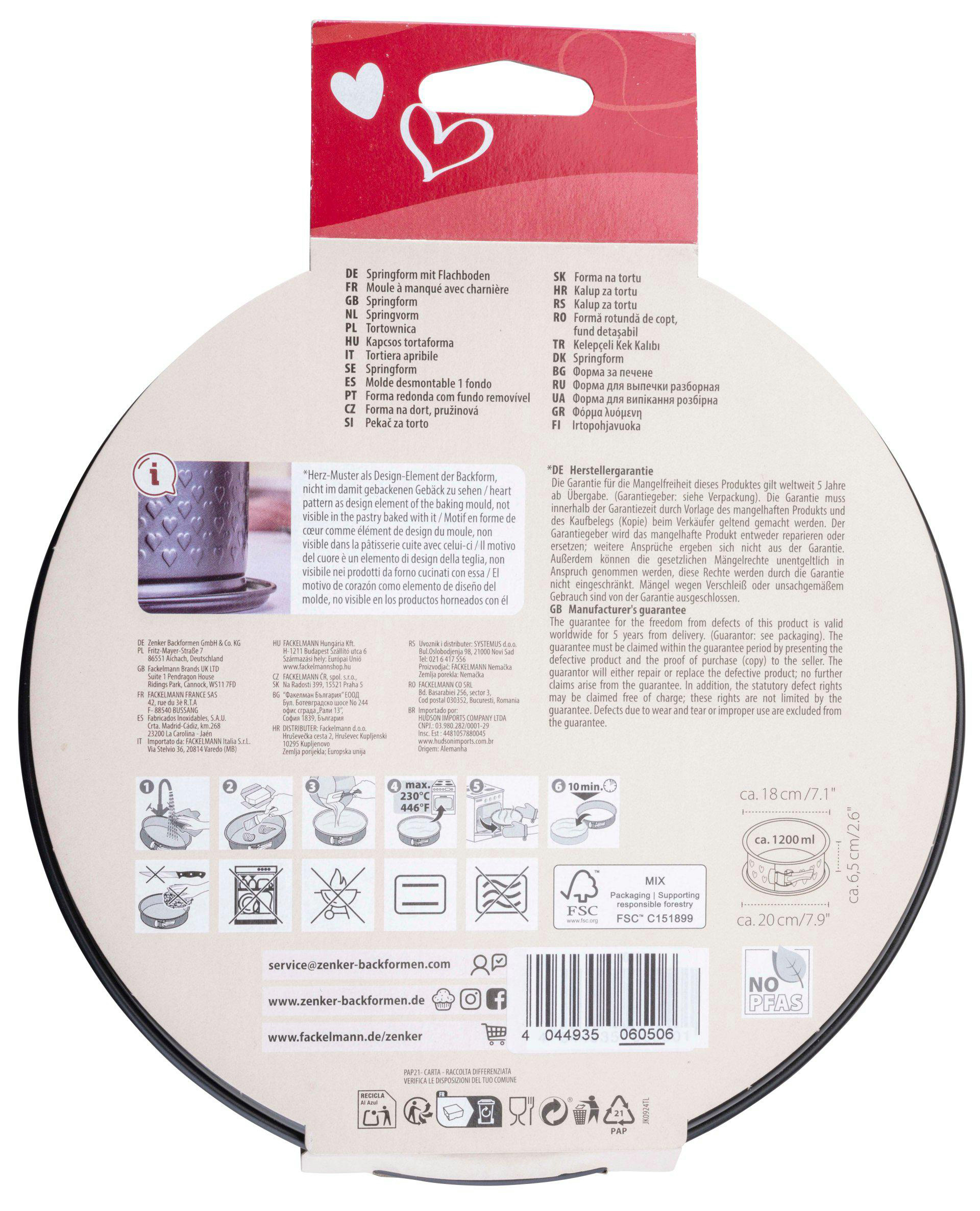 Runde Kuchenform, rotes Herzdesign auf der Verpackung, mit Textetiketten in mehreren Sprachen.